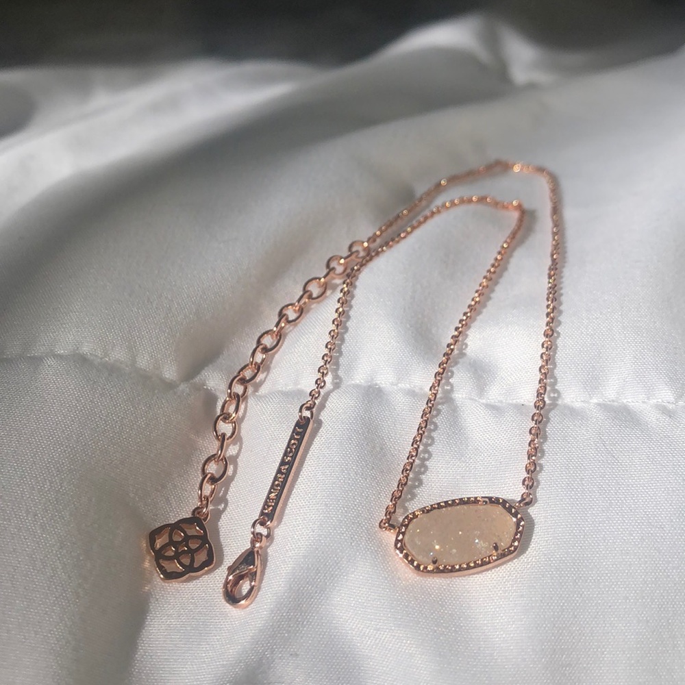 pink and rose gold kendra scott necklace